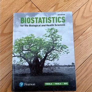 Pearson Biostatistics Textbook with Green Tree Cover